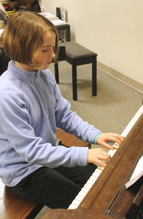 Youth playing piano